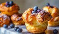 Freshly Baked Popovers with Blueberry, Perfect for National Blueberry Popover Day Royalty Free Stock Photo