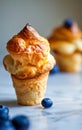 Freshly Baked Popovers with Blueberry, Perfect for National Blueberry Popover Day Royalty Free Stock Photo