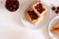Freshly baked puff pastry with cherries