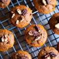 Freshly baked pumpkin muffins with walnuts, cinnamon and nutmeg Royalty Free Stock Photo