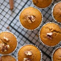 Freshly baked pumpkin muffins with walnuts, cinnamon and nutmeg Royalty Free Stock Photo