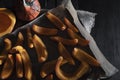 Freshly baked pumpkin slices on a tray. Top view. Vegan diet. Cooking ingredients Royalty Free Stock Photo