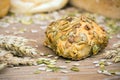 Freshly baked roll with pumpkin seeds Royalty Free Stock Photo