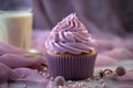 Freshly baked romantic snack treat aesthetics trendy pastel purple lilac colored frosted cupcake sprinkles topping with Royalty Free Stock Photo