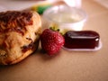 Freshly baked scone topped for cream tea close up shot Royalty Free Stock Photo