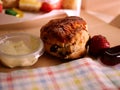 Freshly baked scone topped for cream tea close up shot Royalty Free Stock Photo