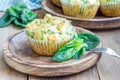 Freshly baked snack muffins with spinach and feta cheese