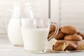 Freshly baked snickerdoodle cookies with old-fashioned milk jug