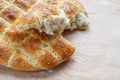 Freshly baked soft flat bread in the style of the Turkish Ramadan Pide on baking paper