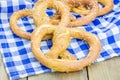 Freshly baked soft pretzels sprinkled with sesame Royalty Free Stock Photo