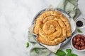 Freshly baked Spanakopita,  spiral filo pastry pie with feta cheese and spinach Royalty Free Stock Photo