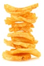 Freshly baked stack of deep ridged potato chips