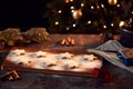 Freshly Baked Star Shaped Christmas Cookies On Board Dusted With Icing Sugar Royalty Free Stock Photo