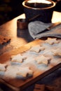 Freshly Baked Star Shaped Christmas Cookies On Board Dusted With Icing Sugar Royalty Free Stock Photo