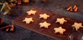 Freshly Baked Star Shaped Christmas Cookies On Board Ready For Decoration Royalty Free Stock Photo