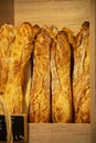 Freshly baked traditional baguettes and bread in small rustic bakery in Provence, South of France