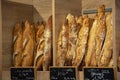 Freshly baked traditional baguettes and bread in small rustic bakery in Provence, South of France
