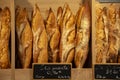 Freshly baked traditional baguettes and bread in small rustic bakery in Provence, South of France