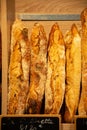 Freshly baked traditional baguettes and bread in small rustic bakery in Provence, South of France