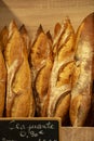 Freshly baked traditional baguettes and bread in small rustic bakery in Provence, South of France