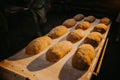 Freshly baked traditional bread on a wooden table Royalty Free Stock Photo