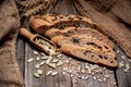 Freshly baked traditional bread on wooden table. Royalty Free Stock Photo