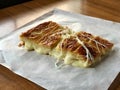 Freshly Baked Turkish Borek with Melted Cheese and Turkish Tea