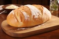 Freshly Baked White Bread on a Wooden Board - Rustic Charm and Irresistible Freshness