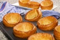 Freshly baked yorkshire pudding in a baking tray