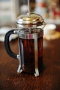 Freshly brewed black tea English breakfast in a French press close up