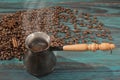 Freshly brewed coffee in cezve jezve Royalty Free Stock Photo