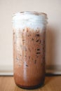 Freshly brewed coffee in a cylindrical glass