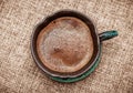 Freshly brewed coffee in a mug. View from above