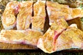 Freshly caught carp filleted and seasoned, prepared for cooking