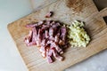 Freshly chopped garlic and bacon Royalty Free Stock Photo