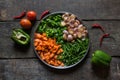 Freshly chopped raw vegetables carrots, beans, onion and green capsicum. Ready to cooking items. Royalty Free Stock Photo