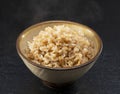 Freshly Cooked Brown Rice on a Black Background Royalty Free Stock Photo