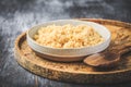 Freshly cooked bulgur in bowl. Bulgur wheat grains Royalty Free Stock Photo