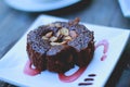 Freshly cooked chocolate brownies cooling with peanut topping