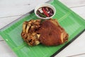 Freshly cooked Filipino food called Crispy Pata or deep fried crispy pork leg Royalty Free Stock Photo