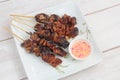 Freshly cooked Filipino food called Isaw baboy or grilled pork intestine