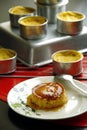 Freshly cooked Leche Flan on a table Royalty Free Stock Photo