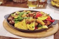 Freshly cooked one pot sausage and vegetables served in frying pan Royalty Free Stock Photo