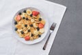 Freshly cooked pancake cereal served with fresh berries, top view