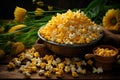 Freshly cooked popcorn in a frying pan, bowl of kernels, and corn ears on wooden background Royalty Free Stock Photo