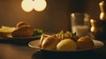 freshly cooked potatoes and a slice of buttered bread sitting on a rustic wooden table