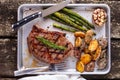 Ribeye Steak On Vintage Wood Table