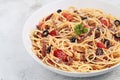 Freshly cooked spaghetti pasta in carbonara sauce with tuyo or dried fish