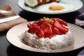 Freshly cooked Tocino or cured pork meat served with fried rice and egg with vegetables Royalty Free Stock Photo