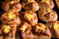 Freshly cooked traditional salted cheese pies called `poale in brau` in display for sale at a weekend street food market in Buchar